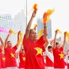 Tres mil vietnamitas de edad avanzada participan en espectáculo de gimnasio y yoga