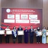 Siete ONG recibieron certificado de mérito por sus aportes al desarrollo de Vietnam