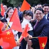 Premier vietnamita se reúne con residentes connacionales en China