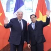 Dirigentes vietnamitas felicitan a Francia por Día Nacional