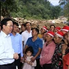 Presidente visita a familias afectadas por inundaciones repentinas en la provincia de Lao Cai