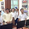 Capitales de Vietnam y Laos refuerzan la cooperación en educación
