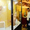 Exhiben en Ciudad Ho Chi Minh antigüedades con imagen de dragón