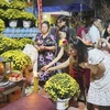 Visitar la pagoda en Año Nuevo Lunar, preciosa costumbre de vietnamitas en Laos