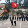 Solemne izamiento de bandera en zonas fronterizas e islas de Vietnam en Tet