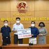 Hanoi favorace a contribuciones a desarollo nacional de vietnamitas de ultramar 