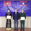 Entregan distinciones honoríficas de Laos a individuos y colectivos médicos vietnamitas