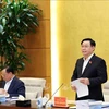 Titular del Parlamento preside reunión sobre proyecto legal y planes de desarrollo de Hanoi