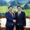Presidente de Laos aprecia cooperación entre Hanoi y Vientiane