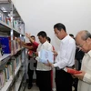 Ouverture d'une bibliothèque au siège de l’Association générale des Vietnamiens du Laos