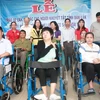 150 fauteuils roulants aux handicapés de la province de Dak Lak