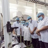 Des Philippins se rendent à l’usine URC Vietnam