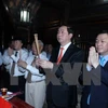 Le président Tran Dai Quang assiste à l'ouverture de la fête traditionnelle de Truong Yen 