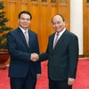 Nguyên Xuân Phuc reçoit le président du Bureau du gouvernement laotien