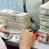 2,5 milliards de dollars de devises transférées à HCM-Ville depuis janvier