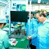 Le Premier ministre Nguyen Xuan Phuc au technopôle de Hoa Lac