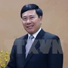 Le vice-PM Pham Binh Minh rend visite à l’ambassade du Vietnam en Chine