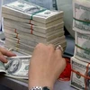 Trois milliards de dollars de devises étrangères envoyées à Hô Chi Minh-Ville en huit mois