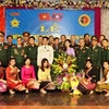 Rencontre entre des volontaires et experts militaires vietnamiens en mission au Laos