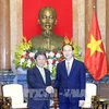Le président Tran Dai Quang reçoit le ministre japonais de la Revitalisation économique