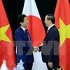 Le président Tran Dai Quang reçoit les Premiers ministres du Japon et du Brunei