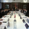 Vietnam et Royaume-Uni s'engagent à promouvoir le commerce bilatéral