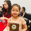 Une petite fille vietnamienne de 7 ans remporte un concours international de piano à New York