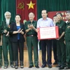 La présidente de l’AN rend visite à des invalides à Ha Nam
