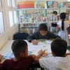 Remise de 500 livres à la bibliothèque de la province de Kampong Speu (Cambodge)