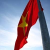 Cérémonie de lever du drapeau national au sommet de Thoi Loi sur l'île de Ly Son 