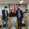 COVID-19 : des masques de protection pour les Vietnamiens en R. de Corée