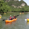 Ninh Binh : faire du kayak au complexe touristique de Trang An, une nouvelle expérience