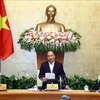 Le PM Nguyen Xuan Phuc préside la réunion du gouvernement de novembre