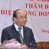 Le PM Nguyên Xuân Phuc rencontre la communauté des Vietnamiens au Myanmar