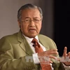 La presse malaisienne couvre la visite du Premier ministre Mahathir Mohamad au Vietnam 