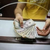 5,5 milliards de devises étrangères transférées à Ho Chi Minh-Ville en 2020