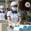 Le Vietnam a exporté 1,37 milliard de masques médicaux en 2020
