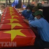 Inhumation des restes de 12 soldats vietnamiens à Gia Lai