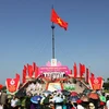 La province de Quang Tri hisse le drapeau de la réunification nationale