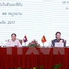 Le Vietnam et le Laos s’échangent sur la décision et la surveillance foncières 