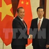  Vietnam-Chine: le vice-PM permanent Truong Hoà Binh rencontre le vice-PM Zhang Gaoli