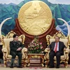 Le général de corps d’armée Luong Cuong en visite officielle au Laos