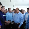 Le PM rencontre des travailleurs de la mine de charbon de Ha Lam
