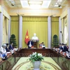 Le président Nguyen Xuan Phuc souligne l'importance de perfectionner l'État de droit socialiste
