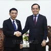 Le vice-PM Tran Luu Quang reçoit le ministre laotien de l'Intérieur Thongchanh Manixay
