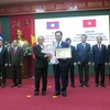 Remise des ordres et insignes du Laos à des organisations et particuliers de Thai Nguyen