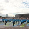 Thua Thien-Hue : plus de 1.000 personnes participent à la 9e Journée internationale du yoga