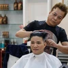 Un coiffeur reproduit gratuitement les coupes de Trump et Kim