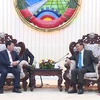 Le Premier ministre laotien salue la coopération entre les polices vietnamienne et laotien