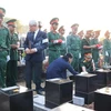 Inhumation des restes de 27 soldats vietnamiens à Binh Phuoc